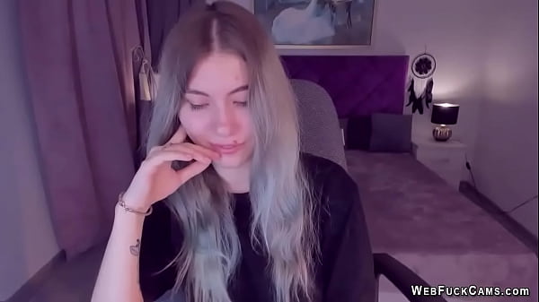 Blonde teen smoking vape and stripping off on solo webcam show