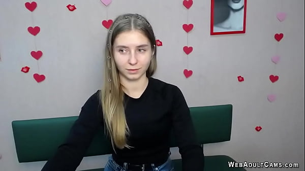 Blonde amateur babe strips to red panties and poses on webcam